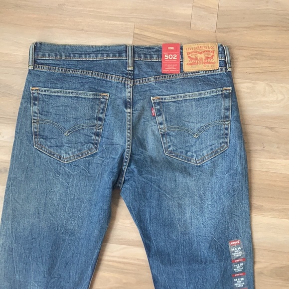 Relist 5/10❌ NWT Levi’s 502 regular taper with 2 way stretch jean size 34 x 30 - Picture 12 of 17